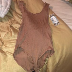 Tan side boob and back out bodysuit